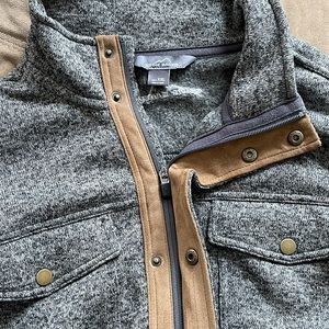 Eddie Bauer zip up and button up polyester jacket. 6 pockets.